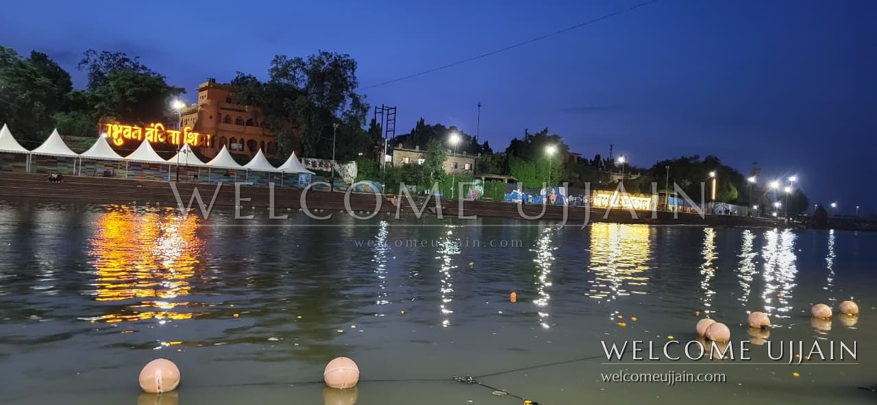 Ram Ghat — Blue hour at Ram Ghat — the ghat lights reflected on the Shipra
